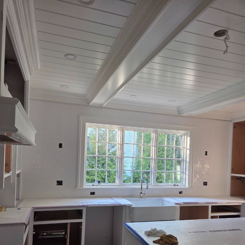 Ceiling with custom wood paneling in a modern interior space