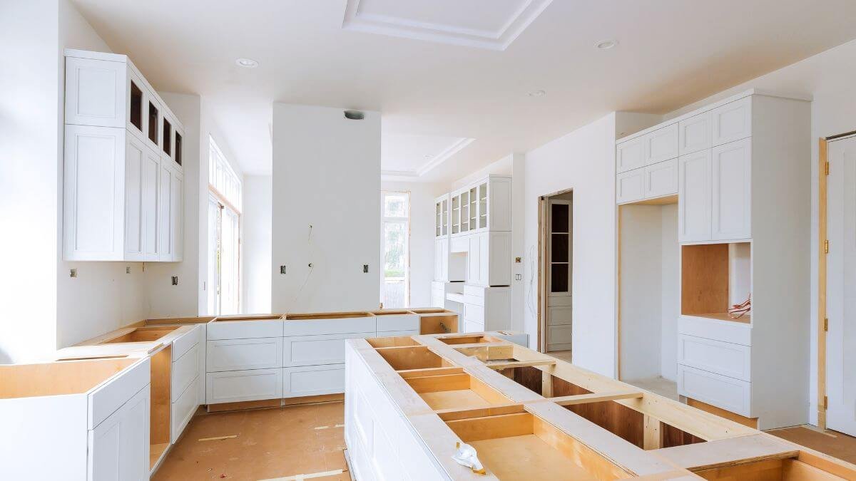 Luxury custom-made white kitchen cabinets with modern finish.