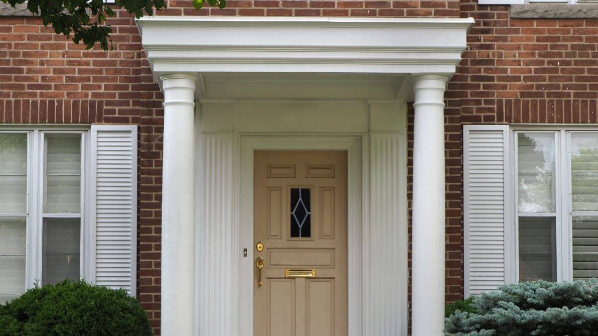 Custom wooden house portico and entryway installation